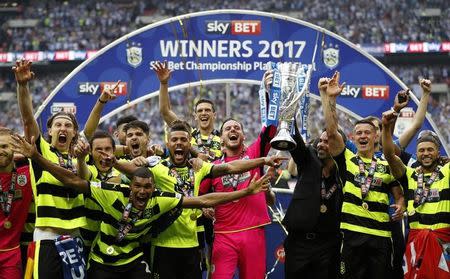 Britain Football Soccer - Reading v Huddersfield Town - Sky Bet Championship Play-Off Final - Wembley Stadium, London, England - 29/5/17 Huddersfield Town manager David Wagner and players celebrate with the trophy after winning the Sky Bet Championship Play-Off Final and getting promoted to the Premier League Action Images via Reuters / John Sibley Livepic
