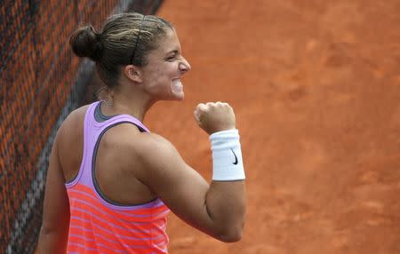 Sara Errani of Italy reacts during the women's singles match against Andrea Petkovic of Germany at the French Open tennis tournament at the Roland Garros stadium in Paris, France, May 30, 2015. REUTERS/Jean-Paul Pelissier