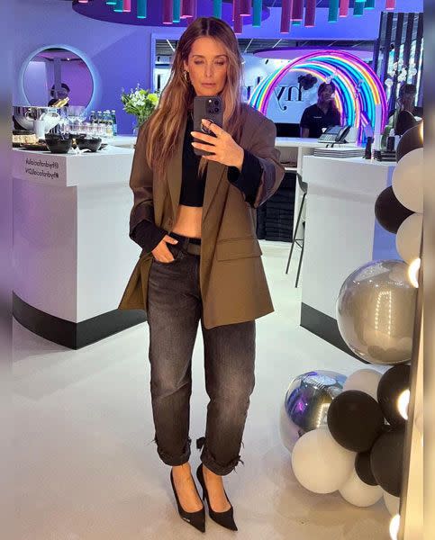 Louise Rednapp posing for a mirror selfie