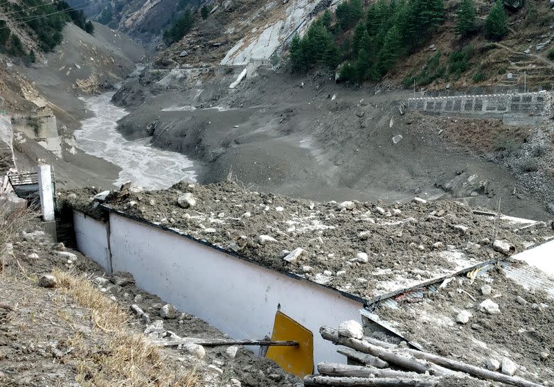 A view shows damage after a Himalayan glacier broke and crashed into a dam at Raini Chak Lata