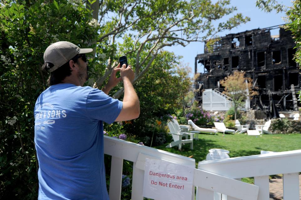 In July, Nantucket Fire Department Capt. Nate Barber took a photo of the Veranda House during the first time back at the historic structure since the weekend fire. Barber was off-duty getting coffee Saturday morning when he noticed smoke coming from the inn. He assisted evacuating guests from the burning building.