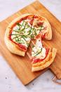 <p>Making great <a href="https://www.delish.com/uk/cooking/recipes/a30686833/homemade-pizza-recipe/" rel="nofollow noopener" target="_blank" data-ylk="slk:homemade pizza;elm:context_link;itc:0;sec:content-canvas" class="link ">homemade pizza</a> can be hard, or so we thought. Turns out, we just hadn't tried making it in an air fryer yet! This super simple recipe yields some of the best pizza to ever come out of our kitchen. The air fryer excels in cooking crust—ours was airy in the centre and crunchy on the outside, just like in a true pizza oven! </p><p>Get the <a href="https://www.delish.com/uk/cooking/recipes/a34665610/air-fryer-pizza-recipe/" rel="nofollow noopener" target="_blank" data-ylk="slk:Air Fryer Pizza;elm:context_link;itc:0;sec:content-canvas" class="link ">Air Fryer Pizza</a> recipe.</p>