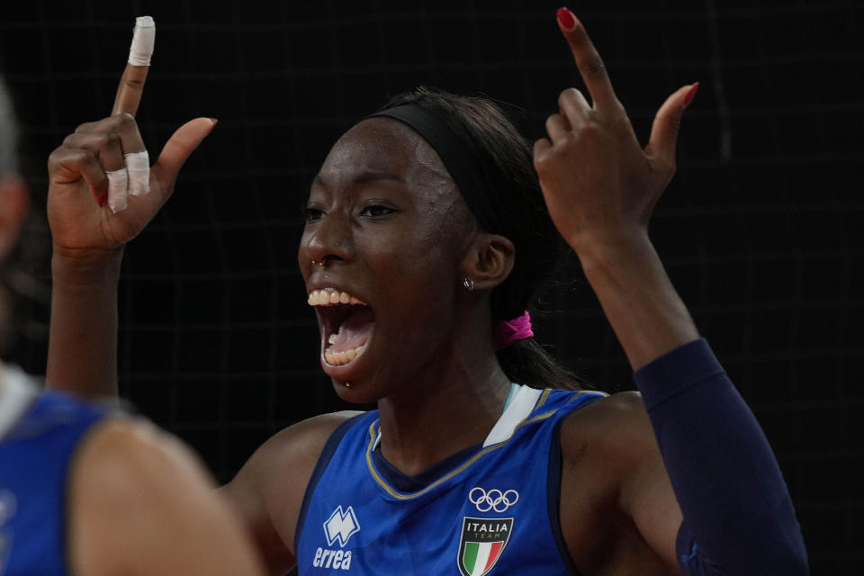 Italy's Paola Ogechi Egonu celebrates winning a point during the women's volleyball preliminary round pool B match between United States and Italy at the 2020 Summer Olympics, Monday, Aug. 2, 2021, in Tokyo, Japan. (AP Photo/Frank Augstein)