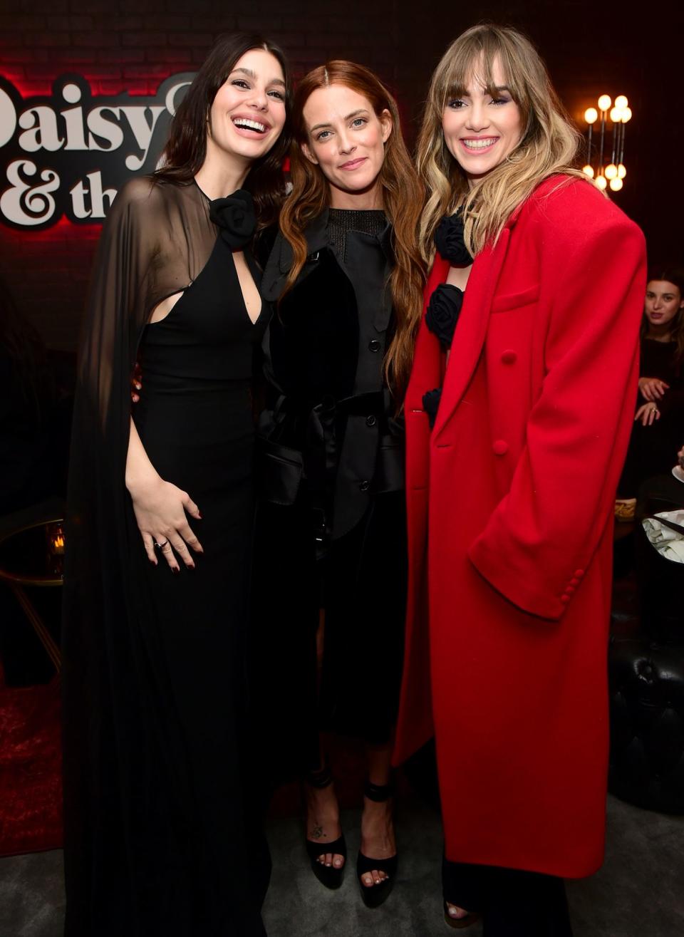 <p><em>Daisy Jones & The Six</em>'s<a href="https://people.com/tag/camila-morrone/" rel="nofollow noopener" target="_blank" data-ylk="slk:Camila Morrone;elm:context_link;itc:0;sec:content-canvas" class="link "> Camila Morrone</a>, <a href="https://people.com/tag/riley-keough/" rel="nofollow noopener" target="_blank" data-ylk="slk:Riley Keough;elm:context_link;itc:0;sec:content-canvas" class="link ">Riley Keough</a> and <a href="https://people.com/tag/suki-waterhouse/" rel="nofollow noopener" target="_blank" data-ylk="slk:Suki Waterhouse;elm:context_link;itc:0;sec:content-canvas" class="link ">Suki Waterhouse</a> get together at the film's Hollywood premiere on Feb. 23.</p>