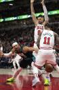 Portland Trail Blazers guard Josh Hart, left, loses the ball to Chicago Bulls forward DeMar DeRozan, right, during the first half of an NBA basketball game Saturday, Feb. 4, 2023, in Chicago. (AP Photo/Erin Hooley)