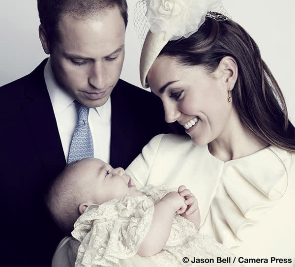 Britain's Prince William, his wife Catherine, Duchess of Cambridge and their son Prince George, pose for the official portrait in London