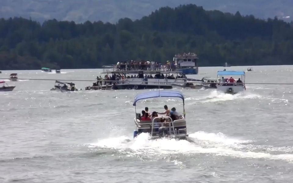 A ferry sinks in the Guatape reservoir near Medellin, Colombia - Credit: Louisa Murphy via Reuters