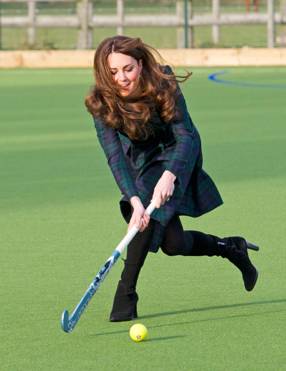 <p>Before becoming a royal, the Duchess of Cambridge was notorious for her athletic nature, regardless of footwear. Middleton, who was the former field hockey captain at St Andrew’s Prep School, was excited to return to the turf and play a quick game of field hockey – in high-heeled boots – at the official opening of the new astroturf in 2012. <span><em>(Photo via Getty Images)</em></span> </p>