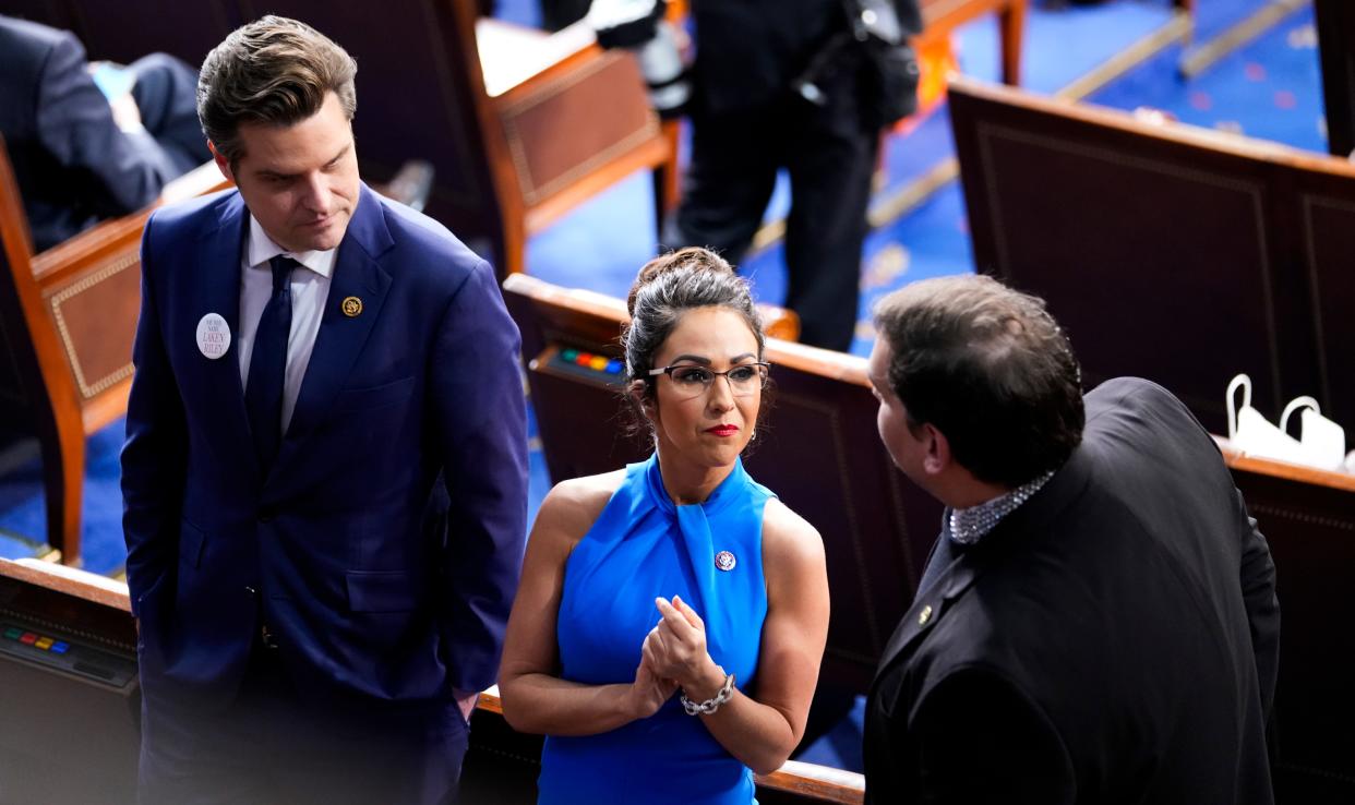 (L-R) Rep. Matt Gaetz and Rep. Lauren Boebert talk to former Representative George Santos before the State of the Union address to Congress at the U.S. Capitol in Washington March 7, 2024.