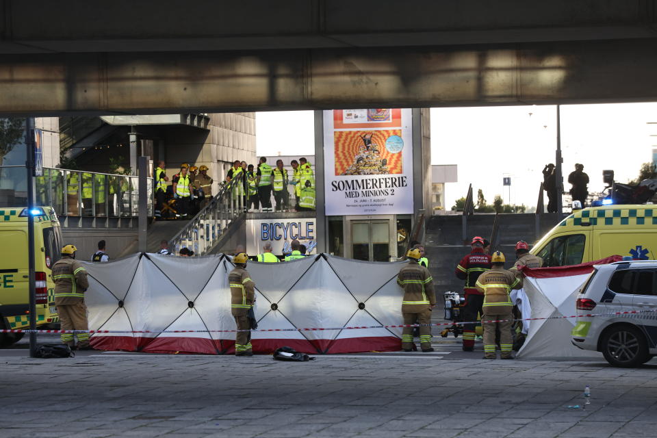 Emergency service at the Field's shopping center after a shooting, in Copenhagen, Denmark, Sunday July 3, 2022. Danish police say several people have been shot at a Copenhagen shopping mall. Copenhagen police said that one person has been arrested in connection with the shooting at the Field’s shopping mall on Sunday. Police tweeted that “several people have been hit” but gave no other details. (Olafur Steinar Gestsson/Ritzau Scanpix via AP)