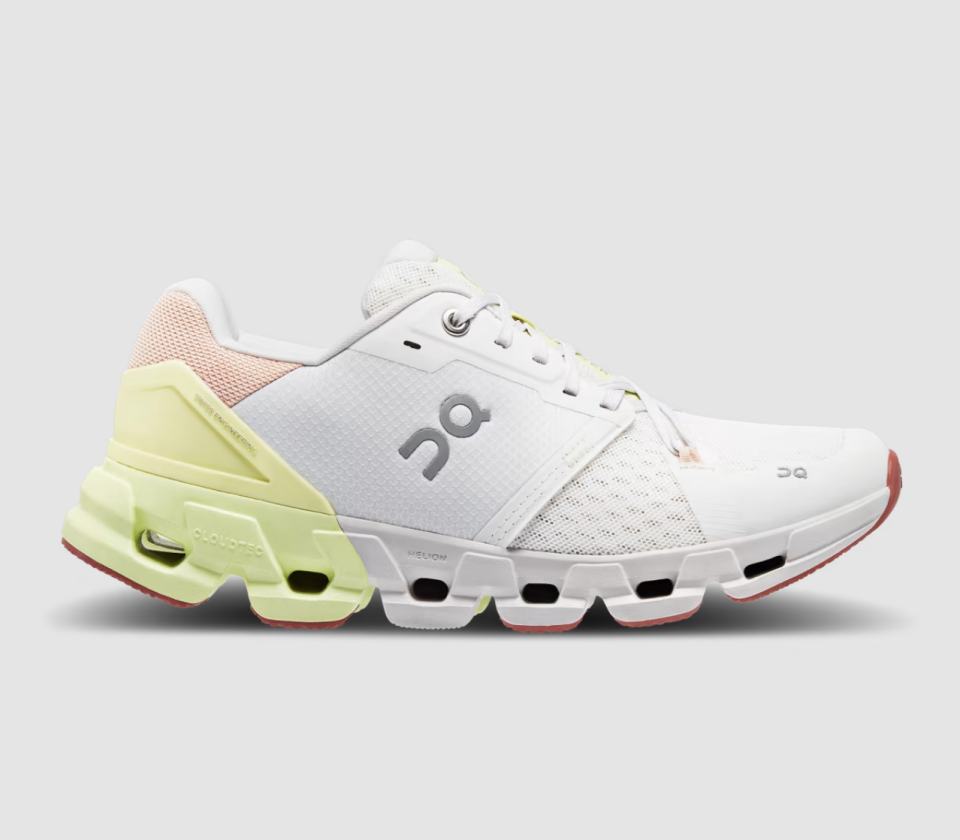 Cloudflyer 4 in white, yellow and pink sneakers, running shoes (photo via On)