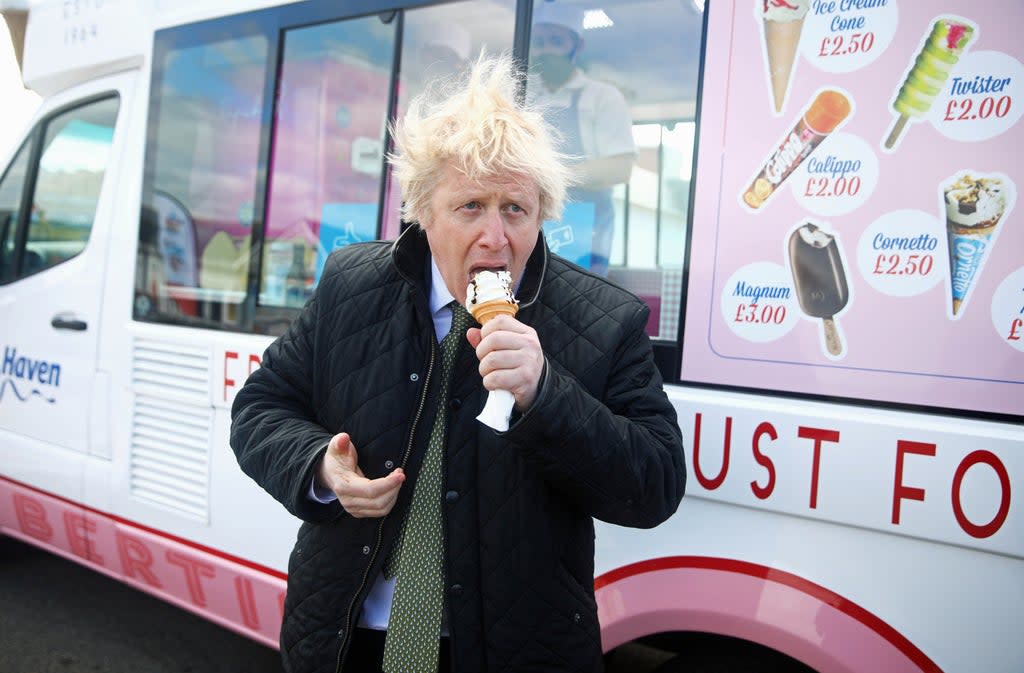 Prime Minister Boris Johnson eats an ice cream during an earlier visit to Cornwall (PA) (PA Archive)