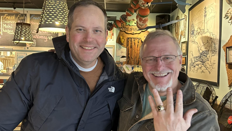 Ken Brooks, left, and Don McGinnis pose for a photo during their first meeting at Full Moon Oyster Bar in Concord.