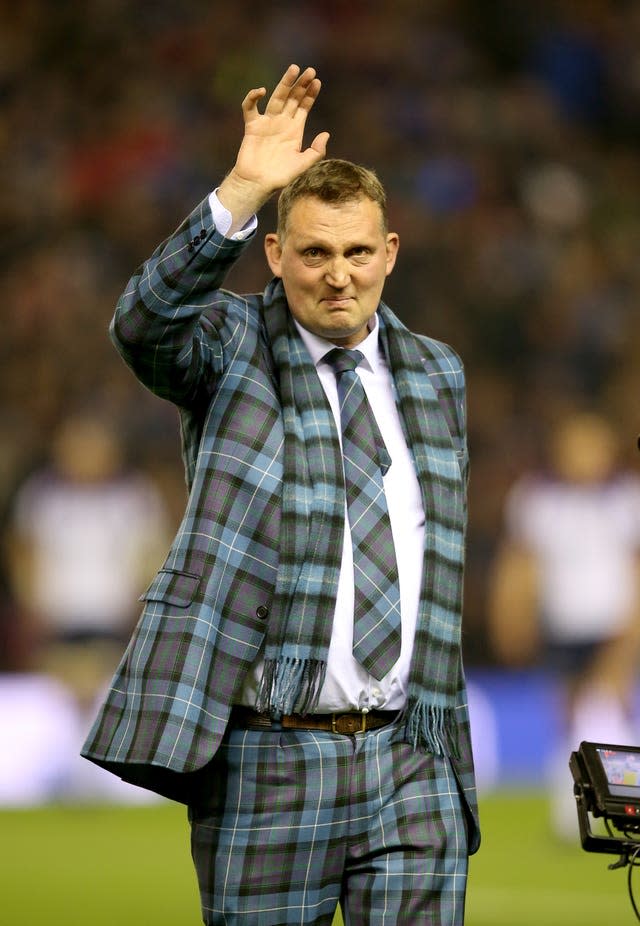 Doddie Weir was known for his bold tartan suits