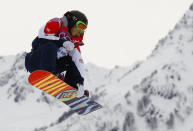 Britain's Jenny Jones performs a jump during the women's snowboard slopestyle finals event at the 2014 Sochi Winter Olympics in Rosa Khutor, February 9, 2014. REUTERS/Lucas Jackson (RUSSIA - Tags: SPORT OLYMPICS SNOWBOARDING TPX IMAGES OF THE DAY) ATTENTION EDITORS: PICTURE 06 OF 25 FOR PACKAGE 'SOCHI - EDITOR'S CHOICE' TO FIND ALL IMAGES SEARCH 'EDITOR'S CHOICE - 09 FEBRUARY 2014'