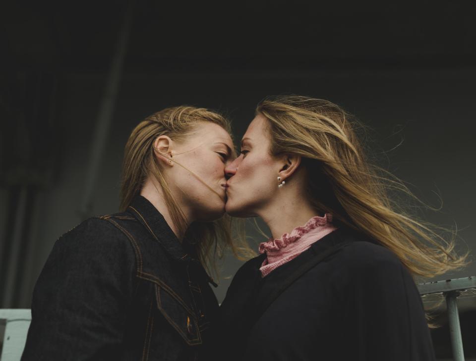 Jessica* says after the first kiss with Sarah* she knew she'd have to leave her husband. Posed by models. (Getty Images)