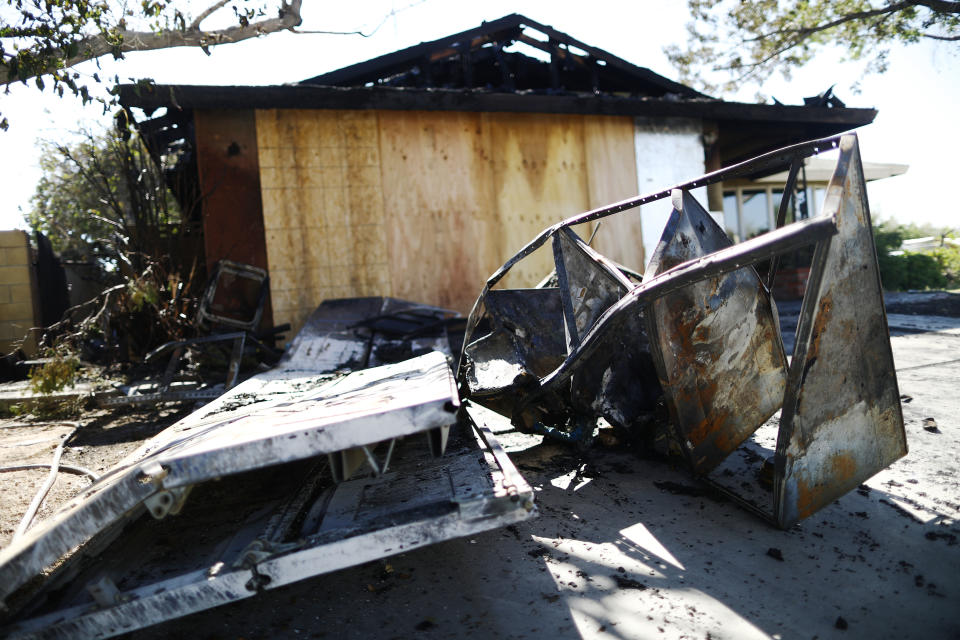 RIDGECREST, CALIFORNIA - JULY 04: Charred items sit in front of a home which caught fire following a 6.4 magnitude earthquake on July 4, 2019 in Ridgecrest, California. The earthquake was the largest to strike Southern California in 20 years with the epicenter located in a remote area of the Mojave Desert. The temblor was felt by residents across Southern California. (Photo by Mario Tama/Getty Images)