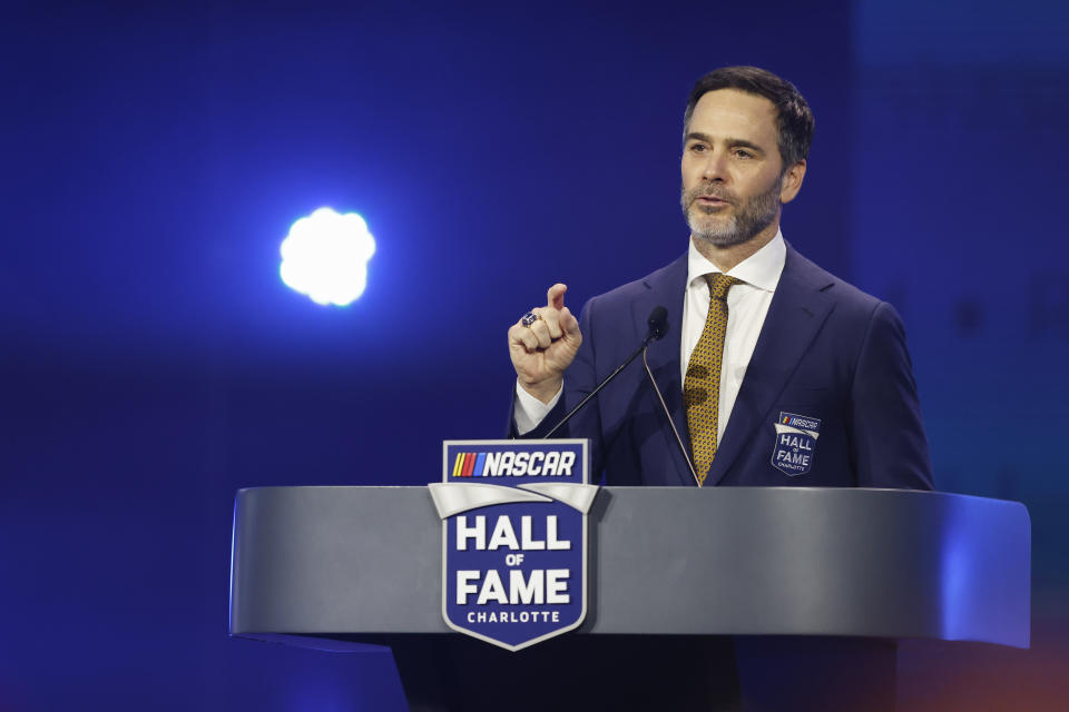 Jimmie Johnson speaks at his induction into the NASCAR Hall of Fame in Charlotte, N.C., Friday, Jan. 19, 2024. (AP Photo/Nell Redmond)
