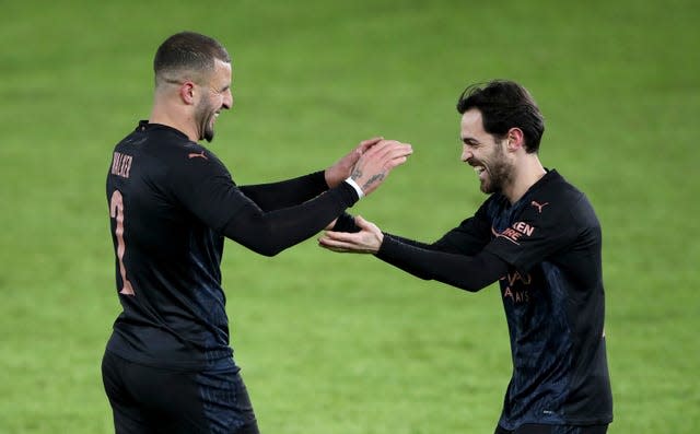 Kyle Walker, left, celebrates his goal with Bernardo Silva