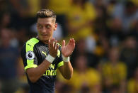 Football Soccer Britain - Watford v Arsenal - Premier League - Vicarage Road - 27/8/16 Arsenal's Mesut Ozil celebrates scoring their third goal Action Images via Reuters / Andrew Boyers Livepic EDITORIAL USE ONLY. No use with unauthorized audio, video, data, fixture lists, club/league logos or "live" services. Online in-match use limited to 45 images, no video emulation. No use in betting, games or single club/league/player publications. Please contact your account representative for further details.