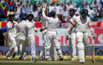 Cricket - India v Australia - Fourth Test cricket match - Himachal Pradesh Cricket Association Stadium, Dharamsala, India - 27/03/17 - Indian players celebrate the dismissal of Australia's captain Steven Smith. REUTERS/Adnan Abidi