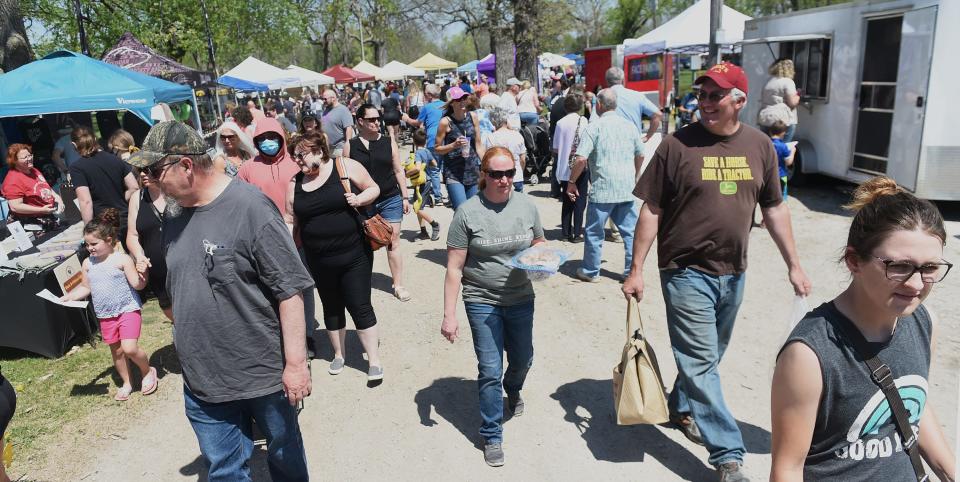 Shoppers crowded at the Maxwell Market in the Park May 2, 2021, in Maxwell.