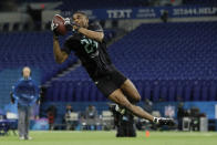 FILE - In this March 1, 2020, file photo, Ohio State defensive back Jeff Okudah runs a drill at the NFL football scouting combine in Indianapolis Okudah is a likely first-round pick in the NFL draft Thursday, April 23, 2020. (AP Photo/Charlie Neibergall, File)