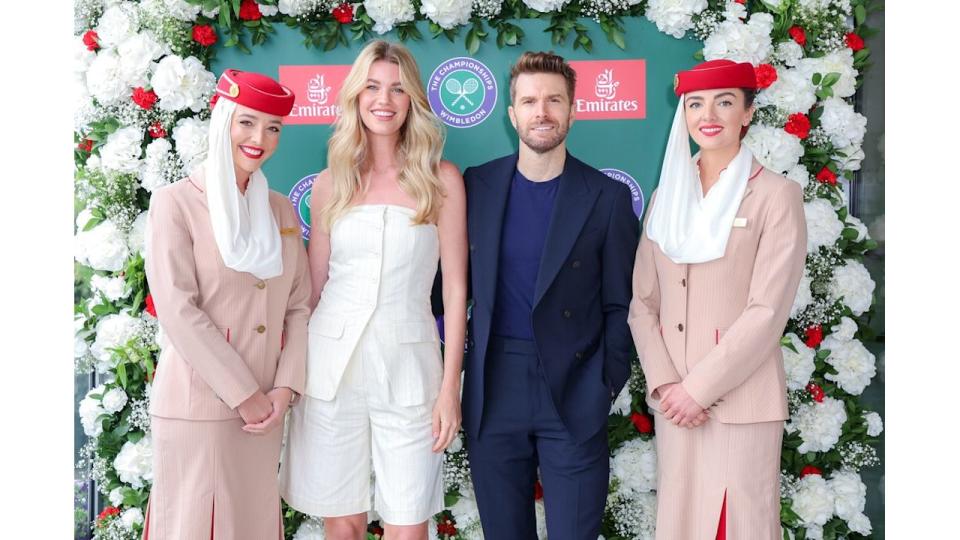 Hannah Cooper and Joel Dommett with two Emirates stewardesses