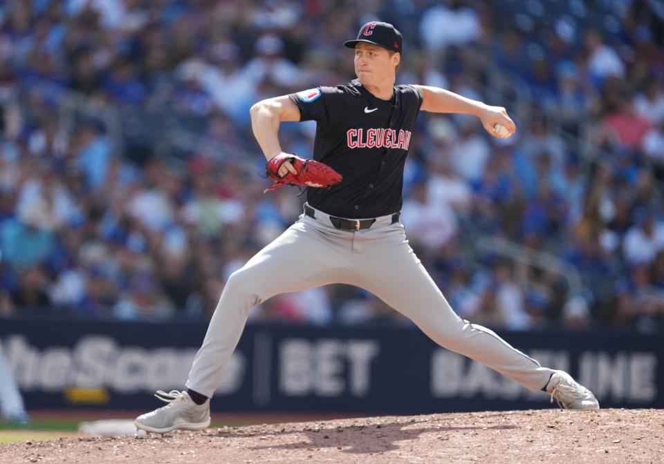 Jun 15, 2024; Toronto, Ontario, CAN; Cleveland Guardians relief pitcher Tim Herrin (29) throws a pitch against the Toronto Blue Jays during the sixth inning at Rogers Centre. Mandatory Credit: Nick Turchiaro-USA TODAY Sports