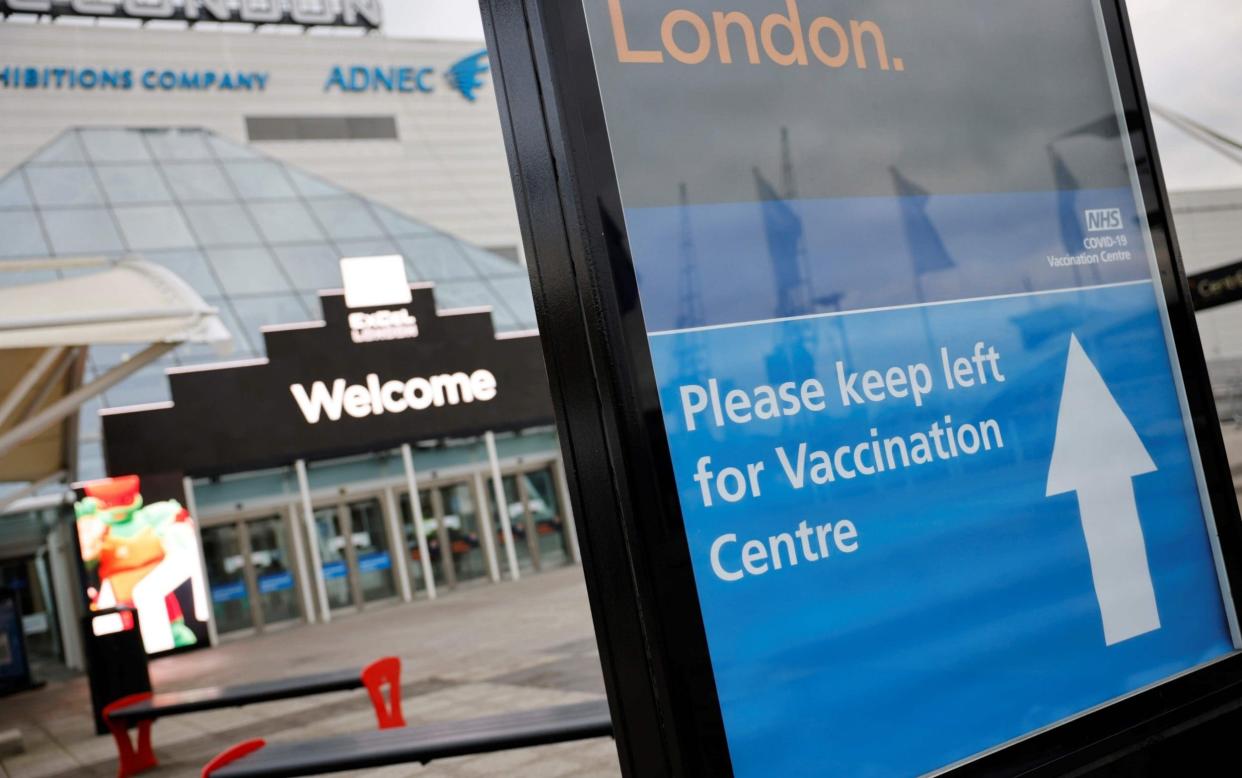 London's Nightingale is is hosting one of the first NHS mass vaccination hubs, which came on stream on Monday - Tolga Akmen/AFP