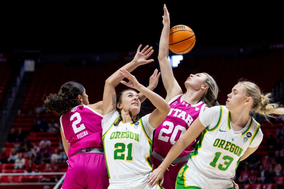 Utah Utes guard Inês Vieira (2) and forward Reese Ross (20) fight for the ball against Oregon Ducks guard Bella Hamel (21) and forward Filippa Tilliander (13) during a game at the Huntsman Center in Salt Lake City on Saturday, Feb. 11, 2023. | Marielle Scott, Deseret News