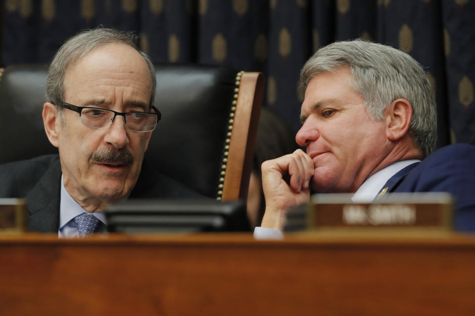 House Foreign Affairs Committee Chairman Eliot Engel, D-N.Y., left, and ranking member Rep. Michael McCaul, R-Texas, talk during a House Foreign Affairs Committee hearing in Washington, Friday, Feb. 28, 2020, as Secretary of State Mike Pompeo testifies. (AP Photo/Carolyn Kaster)