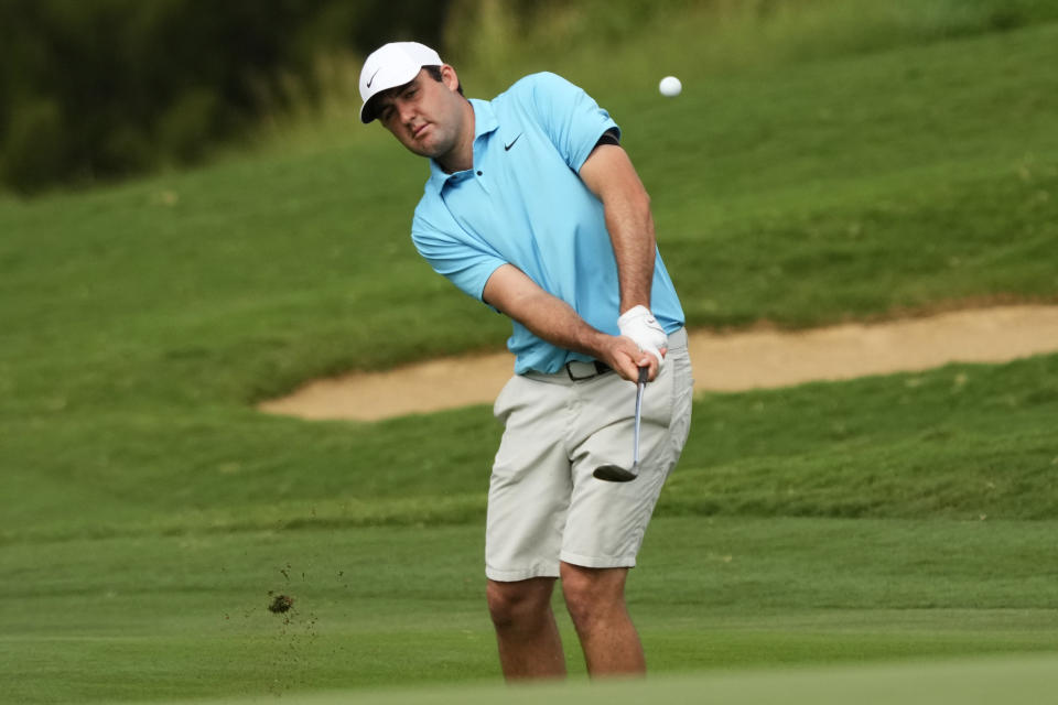 Scottie Scheffler plays a shot from the fringe along on the ninth hole during the Tournament of Champions pro-am golf event, Wednesday, Jan. 4, 2023, at Kapalua Plantation Course in Kapalua, Hawaii. (AP Photo/Matt York)