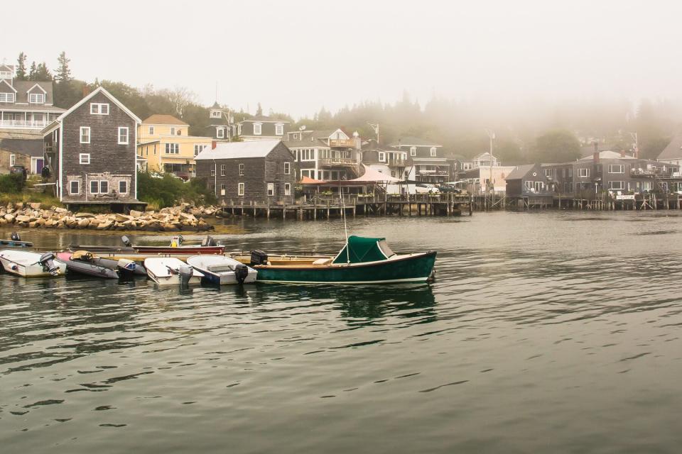 Waterfront of Stonington, Maine with fog