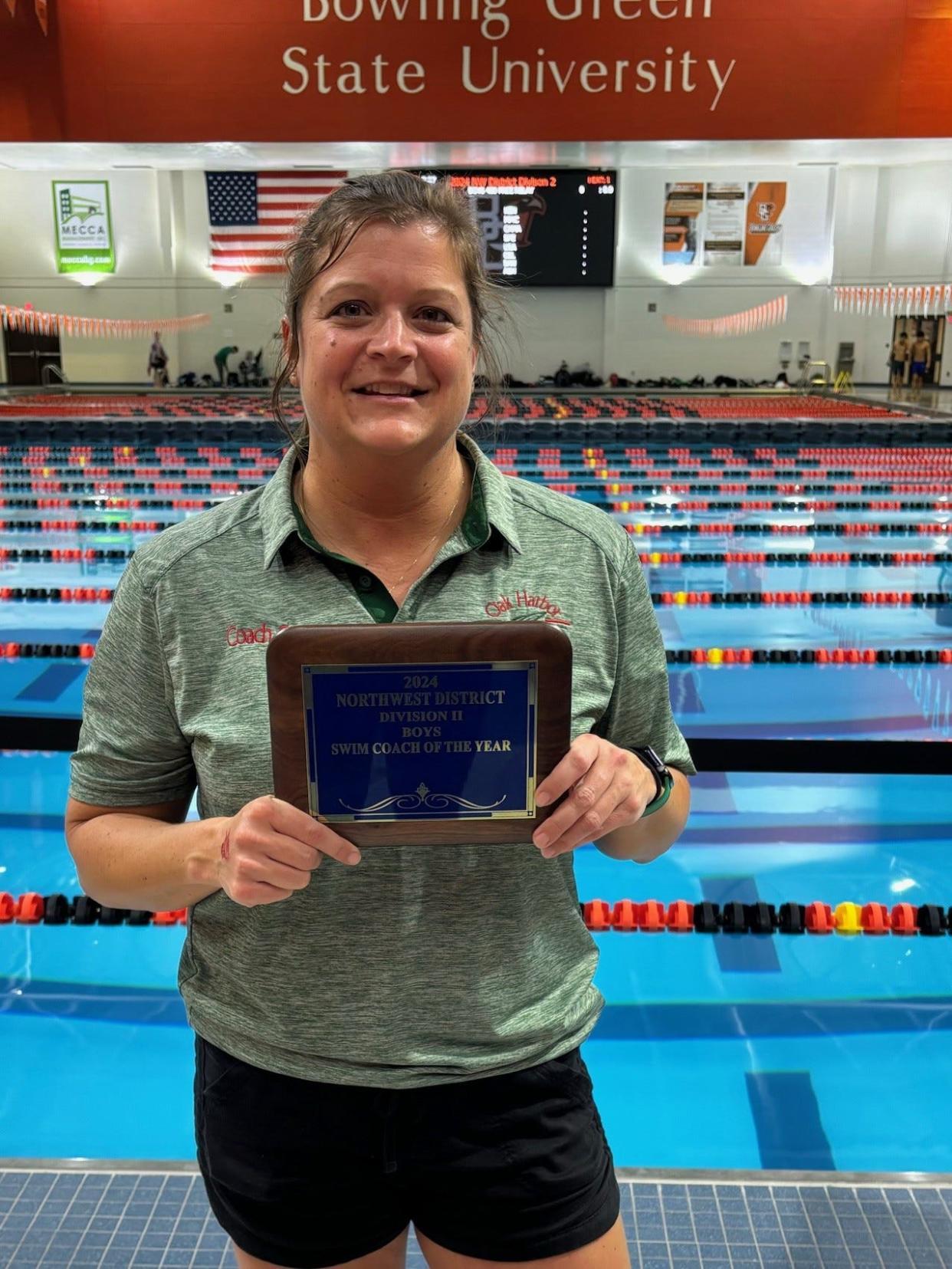 Oak Harbor's Andrea Sorg was recognized Division II Northwest District Swim Coach of the Year for girls. She earned the same honor for boys.