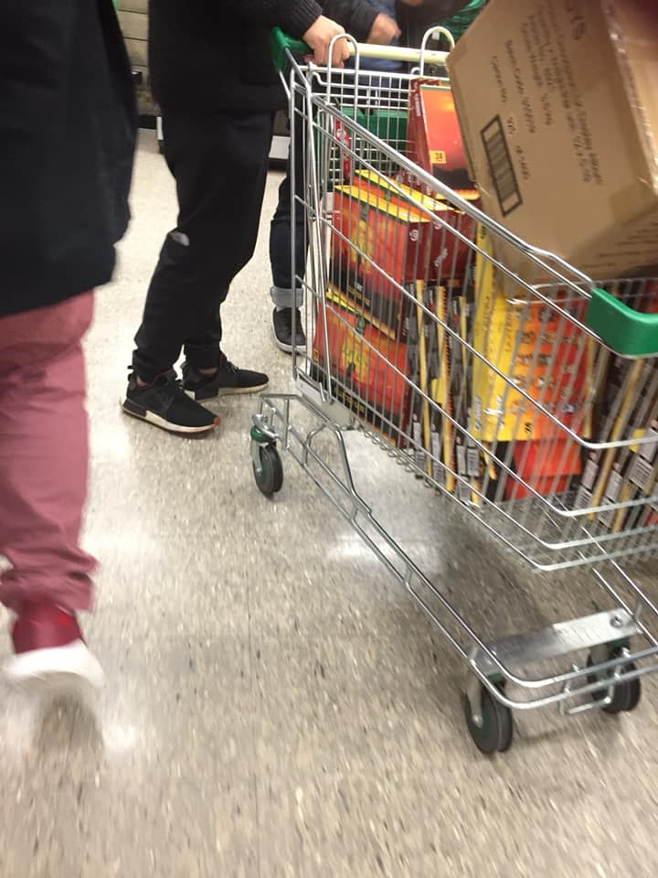 A customer with a trolley full of Lion King collectables at a Woolworths store in Adelaide. 