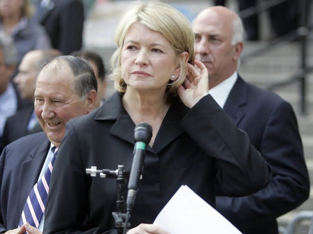 <p>Andrew Gombert/EPA/Shutterstock</p> Martha Stewart speaks outside the Manhattan Federal Court after sentencing on July 16, 2004.