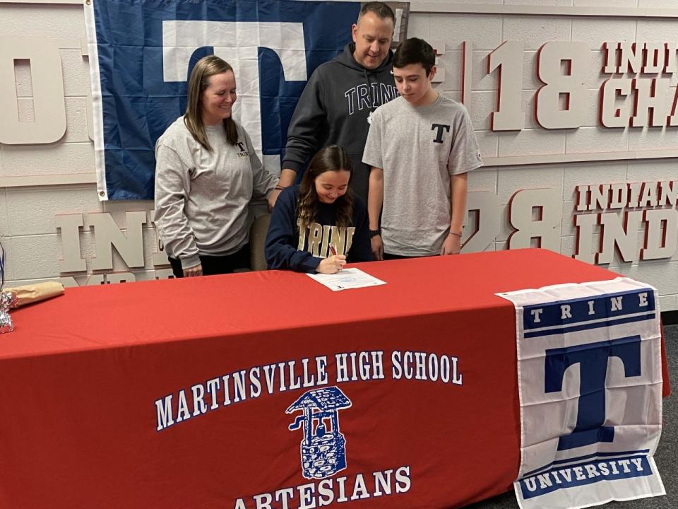 Martinsville gymnast Lily Boyd signs to compete for Trine University on Dec. 6, 2022.