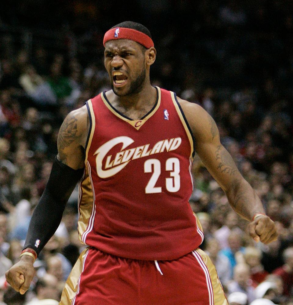 Cleveland Cavaliers forward LeBron James reacts to a basket during the fourth quarter of an NBA basketball game against the Milwaukee Bucks on Friday, Jan. 5, 2007, in Milwaukee. The Cavaliers won 95-86. (AP Photo/Morry Gash) ORG XMIT: WIMG107