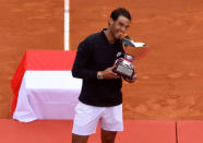 Tennis - Monte Carlo Masters - Monaco - 23/04/17 - Rafael Nadal of Spain poses with his trophy after winning his final tennis match against his compatriot Albert Ramos-Vinolas at the Monte Carlo Masters. REUTERS/Eric Gaillard