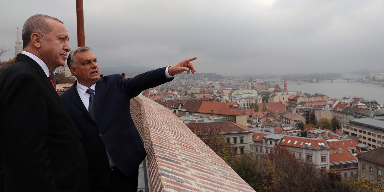 Hungarian Prime Minister Viktor Orban, right, points out city landmarks to Turkish President Recep Tayyip Erdogan, in Budapest, Hungary, Thursday, Nov. 7, 2019.