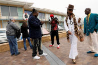 Jerry Coleman (R), a forklift operator by day, takes pictures while he films a scene for his Youtube movie "All Lives Matter" with his friends at the Lorraine Motel, where civil rights leader Martin Luther King Jr. was shot and killed in 1968 in Memphis, Tennessee, U.S., March 26, 2018. Coleman was improvising a scene about what MLK might have thought of the violence on the streets today. "We really want to know what he would think if he was still around. He could be anything, he could be the president right now, we don't know. Whatever's going on in Memphis, I'm on a positive tip. I grew up in a neighbourhood with lots of things going on, but that's not going to stop me from having fun." REUTERS/Jonathan Ernst