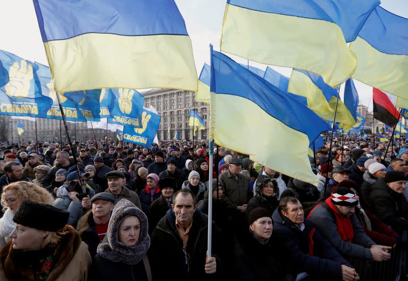 People take part in a rally ahead of the so-called "Normandy" format summit, in Kiev