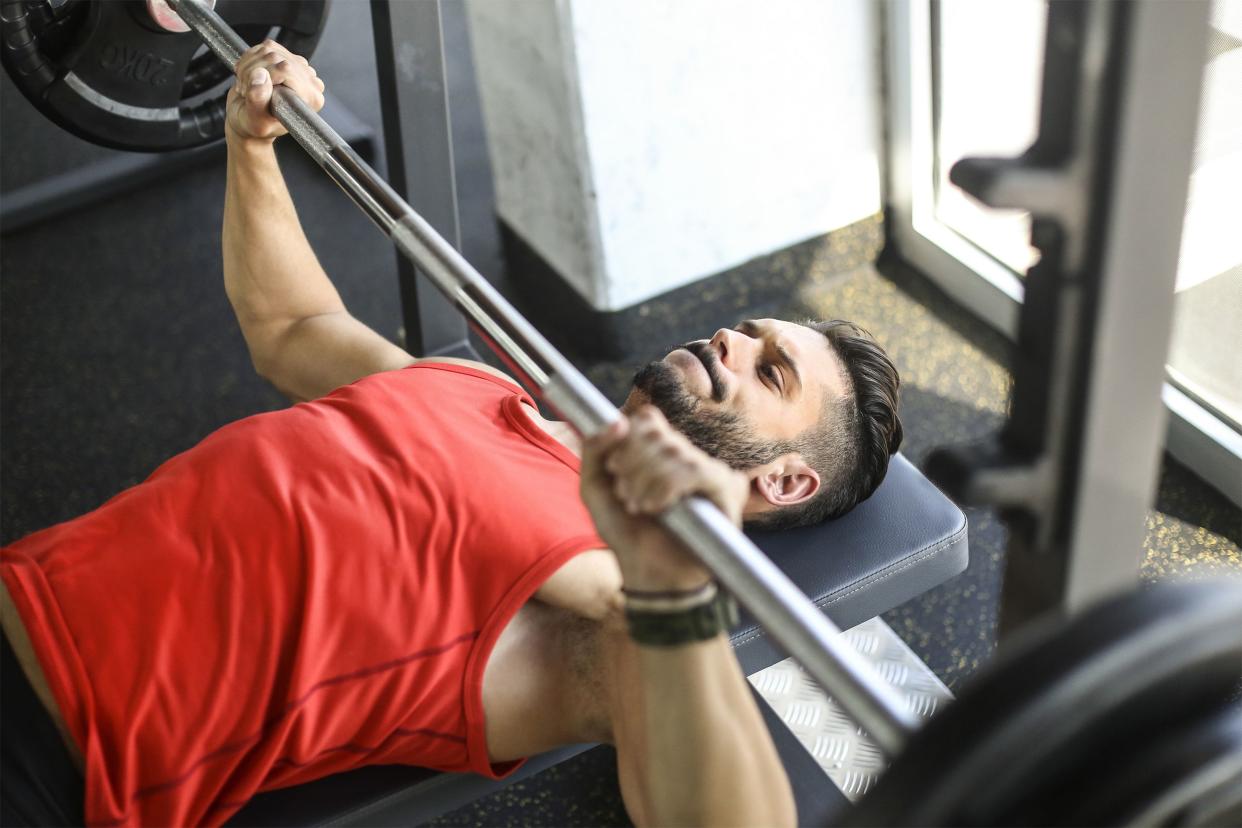 Man doing bench presses