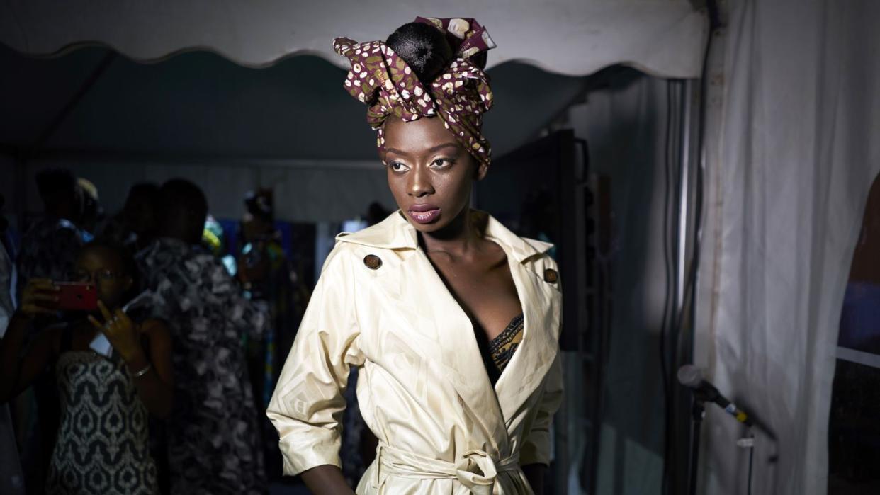 malian model poses before hitting the catwalk at the we wax the world fashion show presented by daniel hechter in bamako on october 20, 2018 photo by michele cattani afp photo credit should read michele cattaniafp via getty images