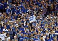 Oct 5, 2014; Kansas City, MO, USA; Kansas City Royals fans hold up a sign against the Los Angeles Angels during game three of the 2014 ALDS baseball playoff game at Kauffman Stadium. Mandatory Credit: Peter G. Aiken-USA TODAY Sports