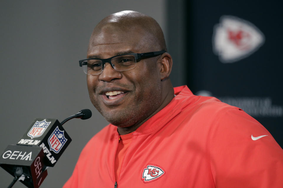 FILE - In this Thursday, Jan. 16, 2020 file photo, Kansas City Chiefs offensive coordinator Eric Bieniemy addresses the media during a news conference for Sunday's NFL AFC championship football game at Arrowhead Stadium in Kansas City, Mo. Troy Vincent wrapped up the NFL’s three-day General Manager Forum and Quarterback Coaching Summit with a passionate plea to anyone who still thinks there aren’t worthy Black candidates for head coaching positions. Vincent praised Houston Texans assistant coach Pep Hamilton, Kansas City Chiefs offensive coordinator Eric Bieniemy, Philadelphia Eagles quarterbacks coach Brian Johnson and several other coaches who gave impressive presentations during this week’s webinar. (AP Photo/Charlie Riedel, File)