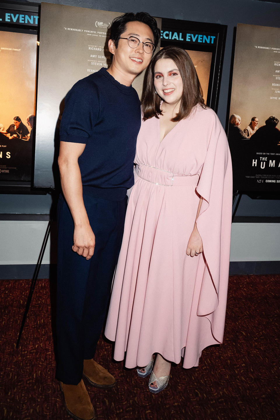 <p>Steven Yeun and Beanie Feldstein attend a screening of A24's <em>The Humans</em> at Village East in N.Y.C. on Nov. 18. </p>