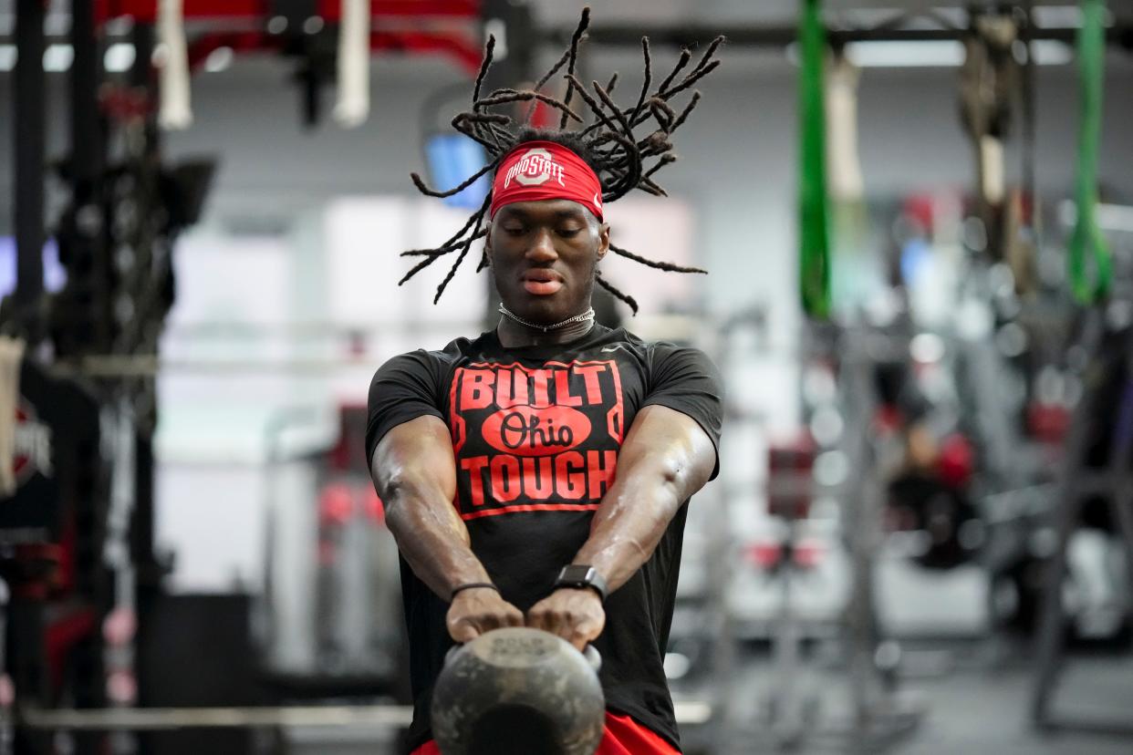 Jul 21, 2023; Columbus, Ohio, USA; Ohio State Buckeyes wide receiver Marvin Harrison Jr. lifts during a summer workout at the Woody Hayes Athletic Center prior to the start of fall camp.