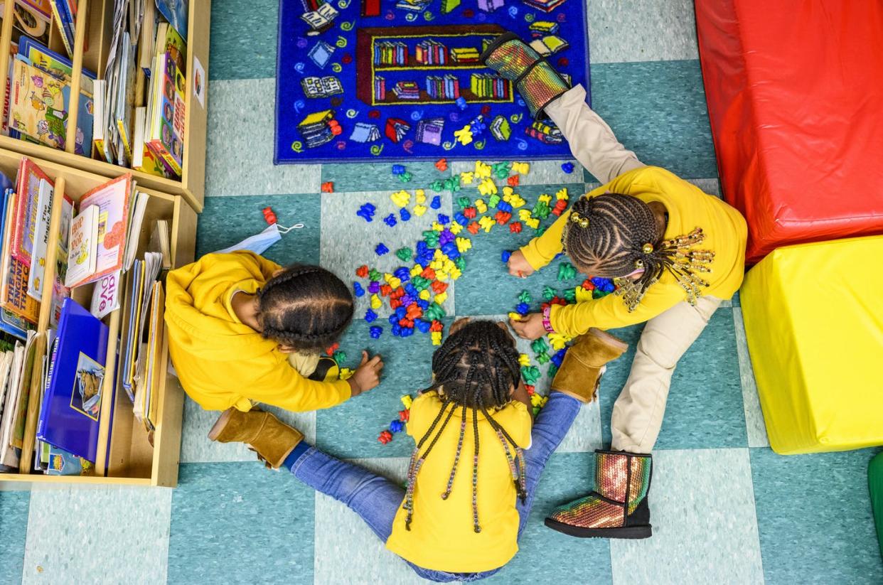 <span class="caption">Child care and preschool are a strain on family budgets.</span> <span class="attribution"><a class="link " href="https://www.gettyimages.com/detail/news-photo/cash-cain-brielle-kelly-and-journee-simon-play-together-n-news-photo/1232619181" rel="nofollow noopener" target="_blank" data-ylk="slk:Matt Roth for The Washington Post via Getty Images;elm:context_link;itc:0;sec:content-canvas">Matt Roth for The Washington Post via Getty Images</a></span>